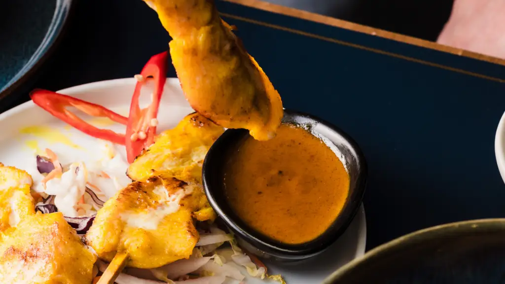 thai chicken satay skewers with a peanut dipping sauce