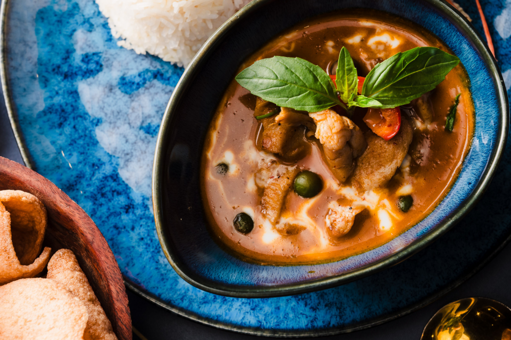 Top down of a chicken panang curry.
