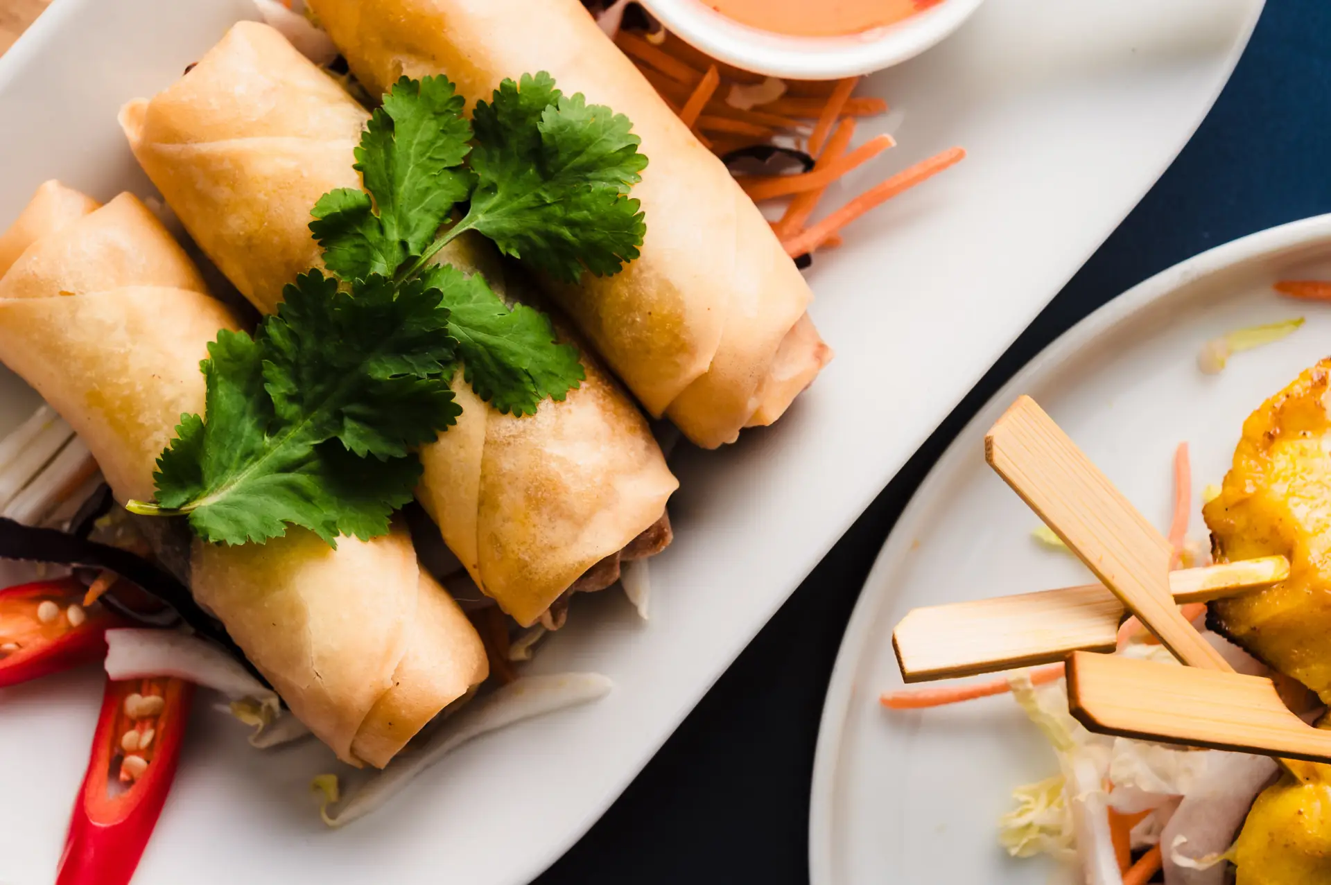 thai spring rolls with a sweet chilli dipping sauce